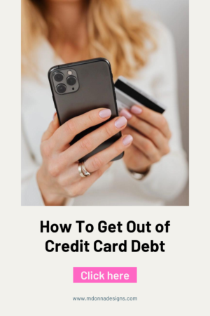 Individual analyzing credit card and financial information on their phone, reflecting the challenge of credit card debt management.